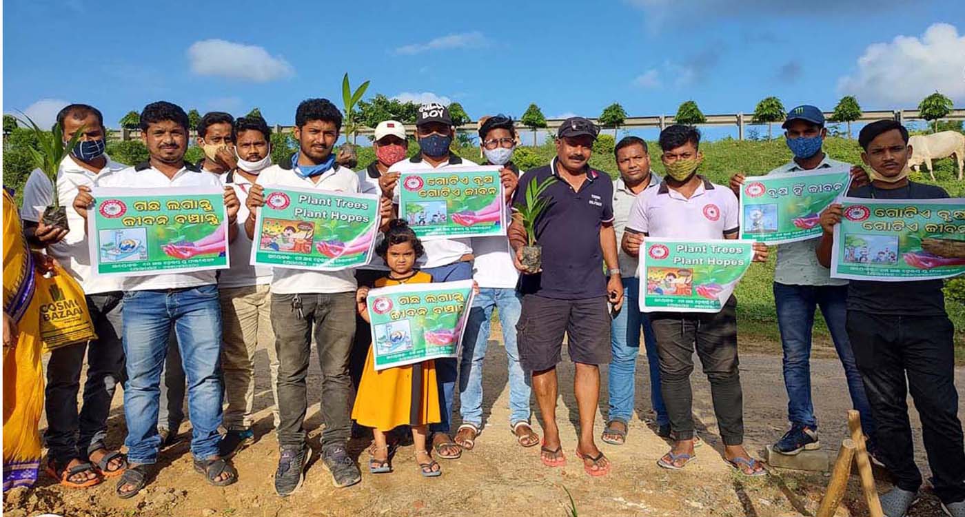 Group of people holding signs